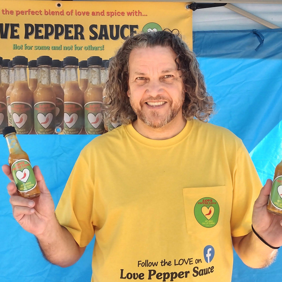 Love Pepper Sauce market stall at an event